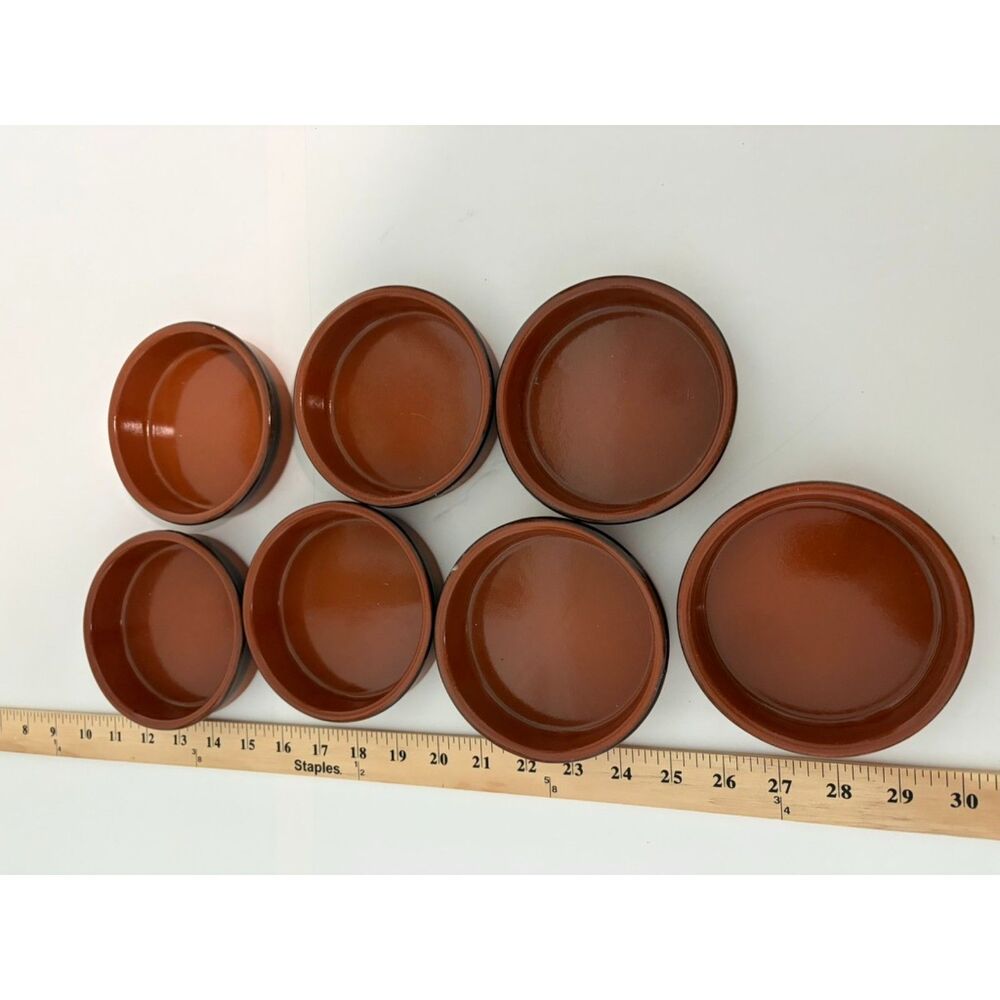 7- terra cotta 5" dishes